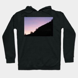 Contrasting scene of silhouette slope of Mount Maunganui Hoodie